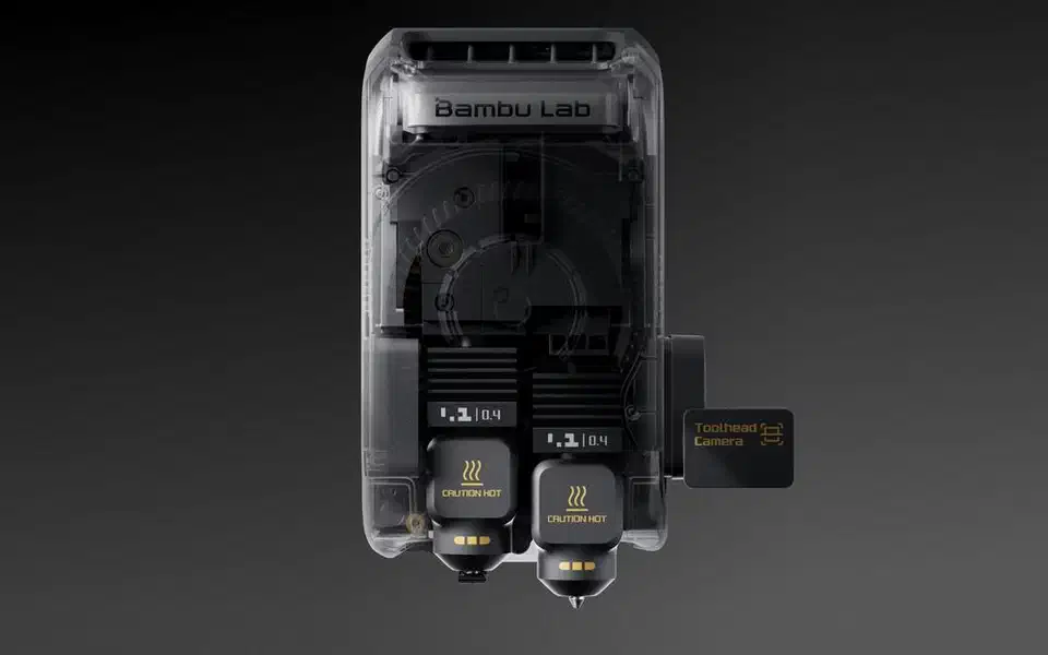 Cutaway render of the X2D toolhead showing two hot ends side by side, each marked 0.4mm, with the toolhead camera module on the right