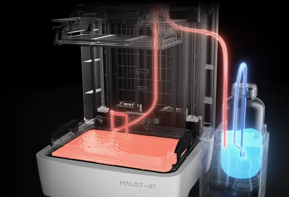 Halot X1 AFU drawing resin from a bottle through a tube that runs over the frame and down into the vat
