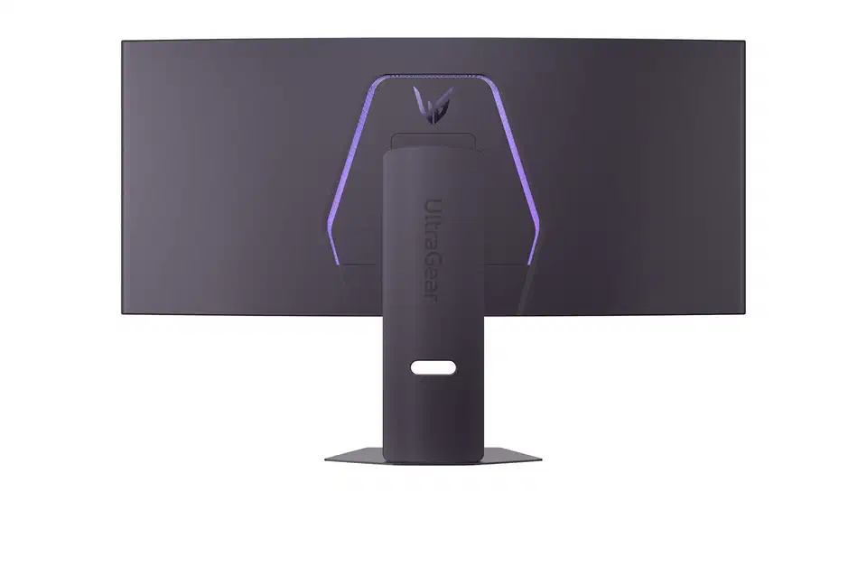Rear view of the LG 39GX950B showing purple backlighting around the UltraGear logo and a broad flat stand pillar on a hexagonal base