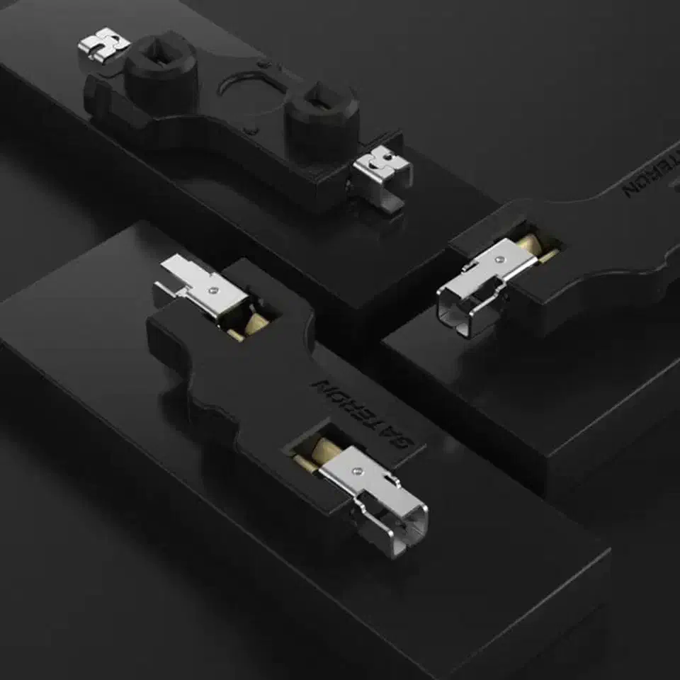 Black Gateron 2.0 hot-swap sockets showing metal snap contacts and GATERON branding on a dark background