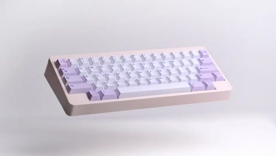 Compact keyboard fitted with PolyCaps Hippo pastel lavender and white PBT keycaps with dye-sublimated legends, floating against a pale background