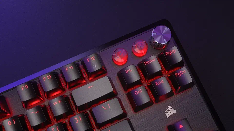 Corsair K70 PRO TKL top right corner with the red backlit Game Mode button beside the volume wheel