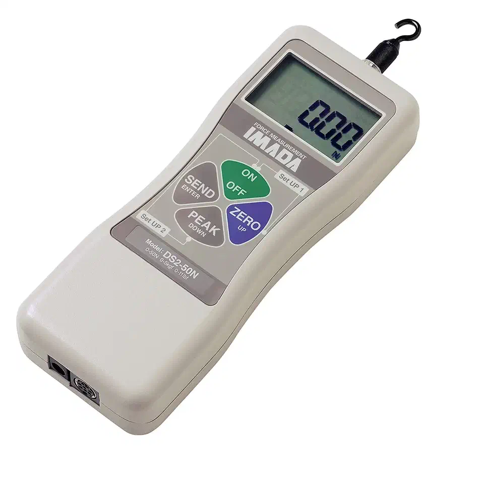 Imada DS2 series handheld digital force gauge with a large LCD readout, function buttons, and a hooked measuring probe