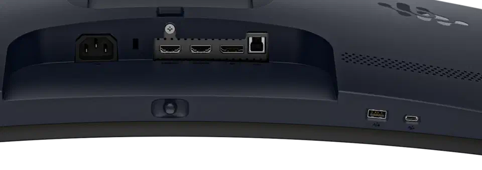 Close crop of the AW3426DW port bay: power inlet, two HDMI sockets, one DisplayPort and a USB-B upstream in the recess, with a single USB-A port and a downstream USB-C on the lower edge