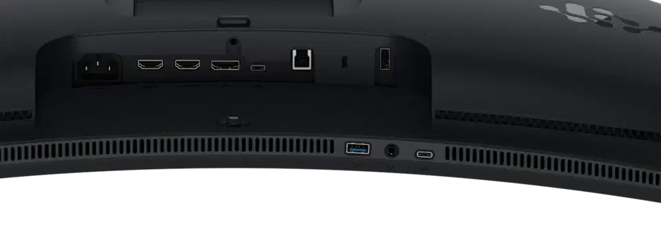 Close crop of the AW3926QW port bay: power inlet, two HDMI sockets, DisplayPort, a USB-C upstream and a USB-B upstream in the recess, with a USB-A port, headphone jack and downstream USB-C on the lower edge