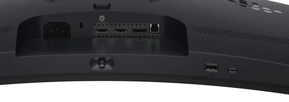 Close crop of the AW3426DWM port bay: power inlet, two HDMI sockets, one DisplayPort and a USB-B upstream in the recess, with a single USB-A port and a downstream USB-C on the lower edge