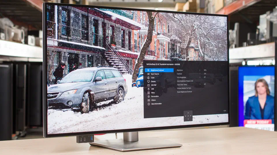Dell U3225QE front three-quarter product shot on the RTINGS test bench