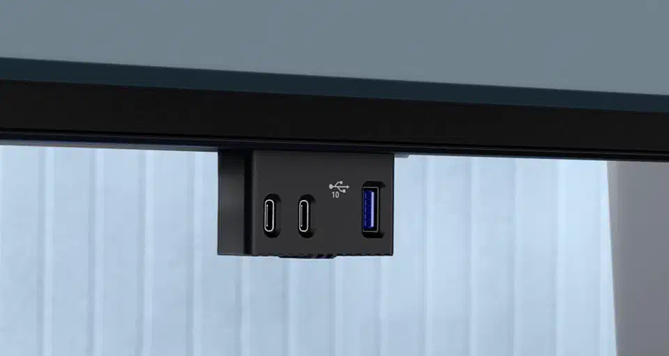 Pop-out quick-access port module under the bottom bezel of the U5226KW, holding two USB-C ports and one blue USB-A port