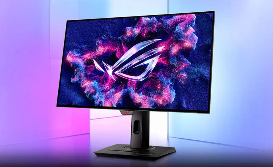 Asus ROG Strix XG27AQDMG gaming monitor with a glossy WOLED panel showing the ROG logo on a purple nebula wallpaper