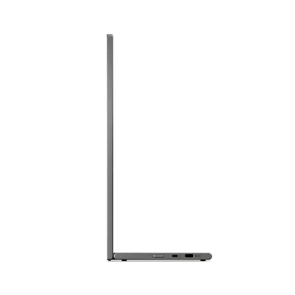 Side profile of the Lenovo L16 standing upright, showing the thin panel edge and the flat base that holds the power button, Kensington slot and USB-C port