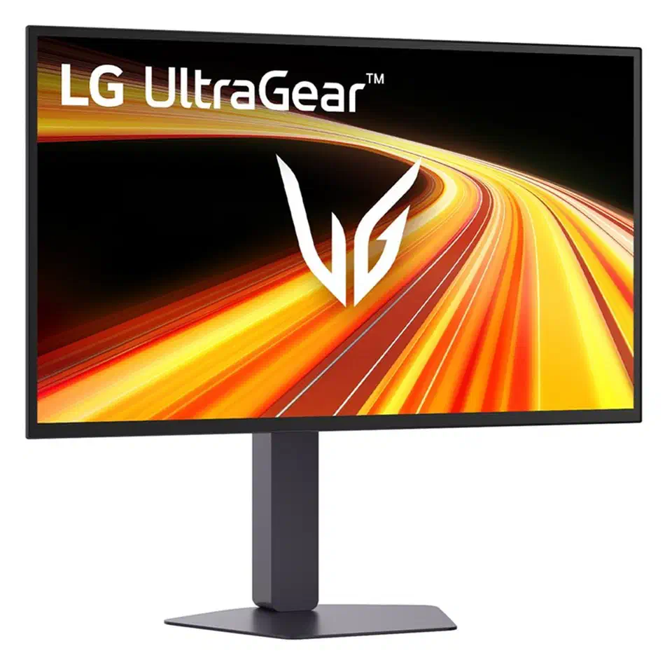 LG 27GX790B monitor at a three-quarter front angle on a slim pillar stand with a flat base, UltraGear artwork on screen