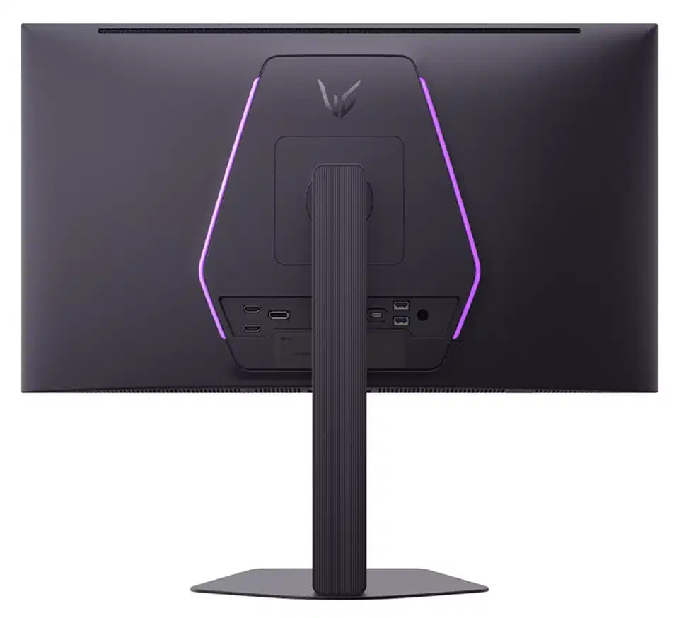 Rear of the LG 27GX790B showing purple hexagonal RGB lighting, the ridged stand column, and a row of DisplayPort, HDMI, USB and audio ports