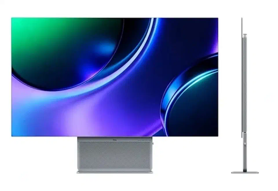 TCL 32X3A OLED flagship monitor shown front and side, with a silver Bang and Olufsen speaker bar under the panel