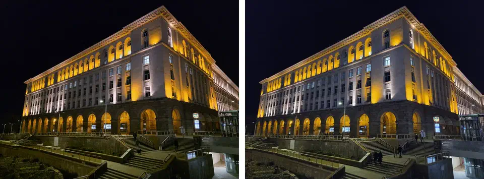 Same floodlit night building shot twice, Galaxy S25 Ultra at ISO 2000 on the left and Galaxy S26 Ultra at ISO 1000 on the right, both at 1/100s