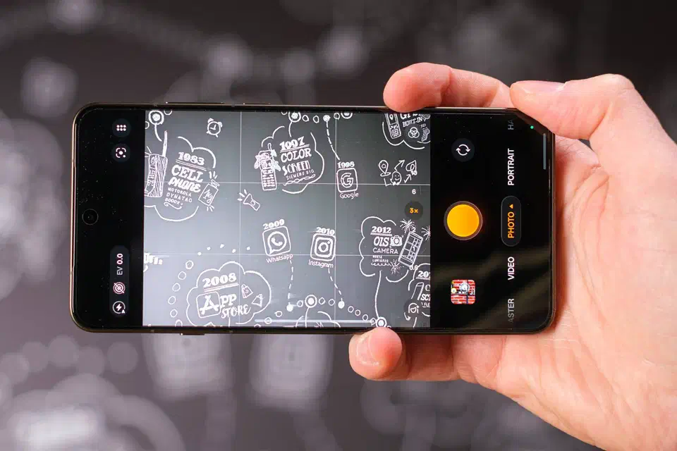 Close-up of the Find X9 Ultra camera island with the 3x periscope lens in focus inside its metal ring
