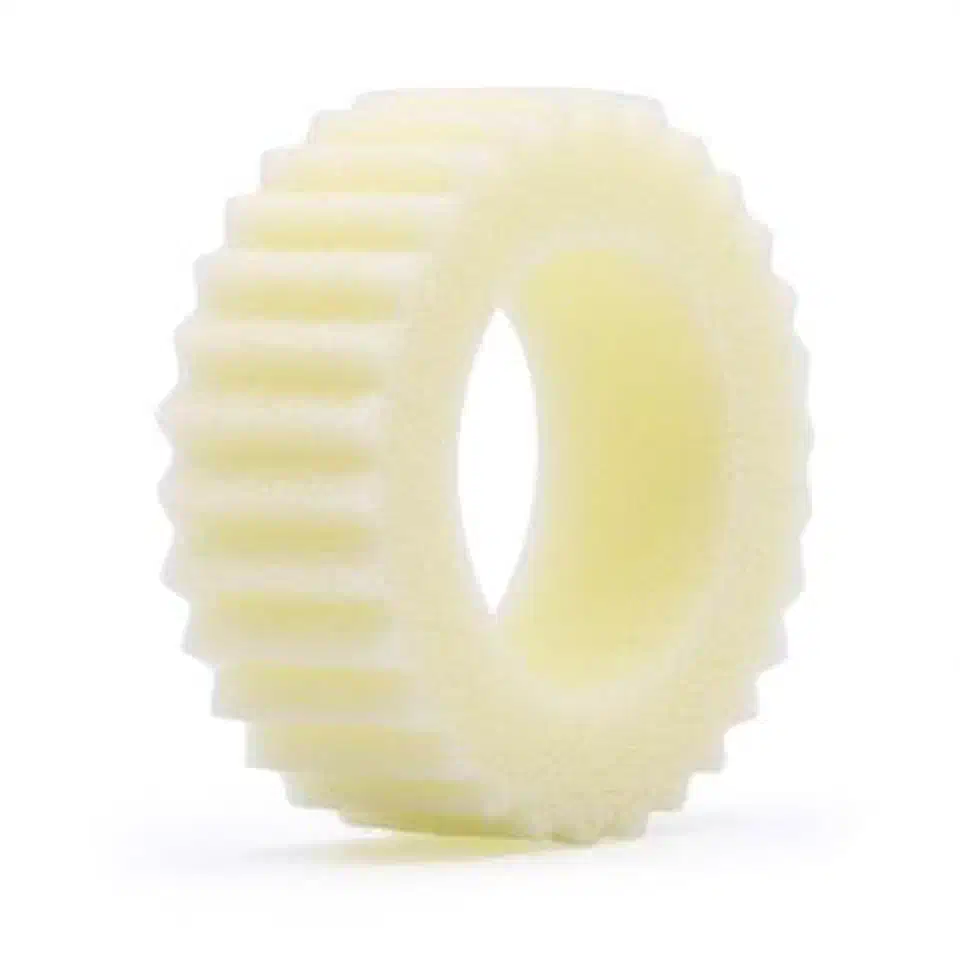 Single Crazy Crawler LaserFoam 1.0 insert showing its serrated ridged end and open-cell foam ring