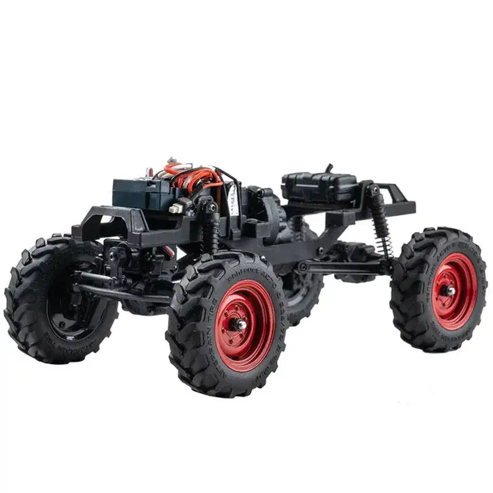 FMS FCX24 rolling chassis on portal axles, showing the raised differentials and red beadlock wheels