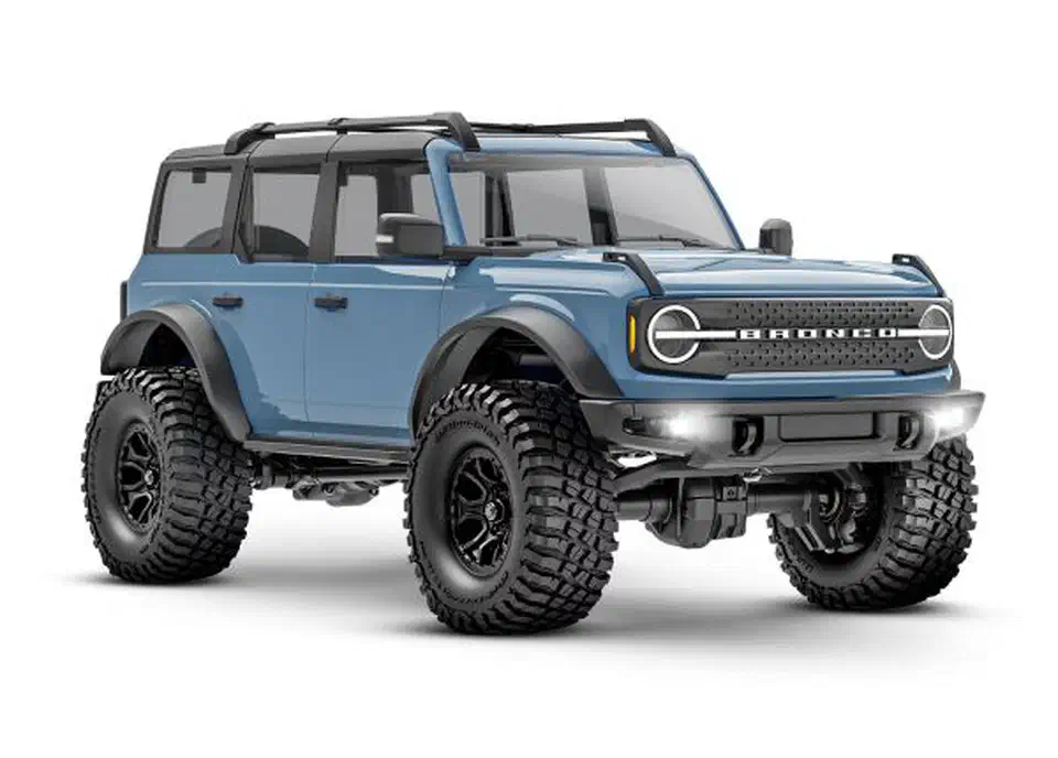 Traxxas TRX-4M Ford Bronco 1/18 crawler in Area 51 gray, three-quarter front view showing the detailed grille and bumper